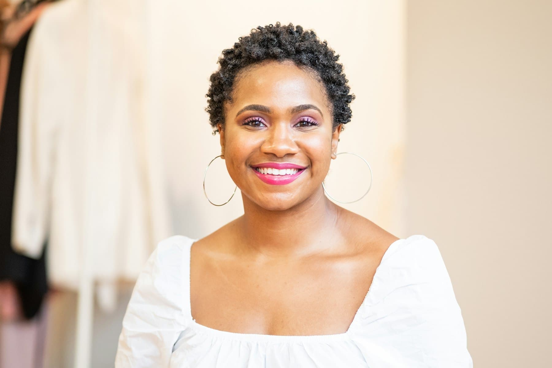 A smiling business owner